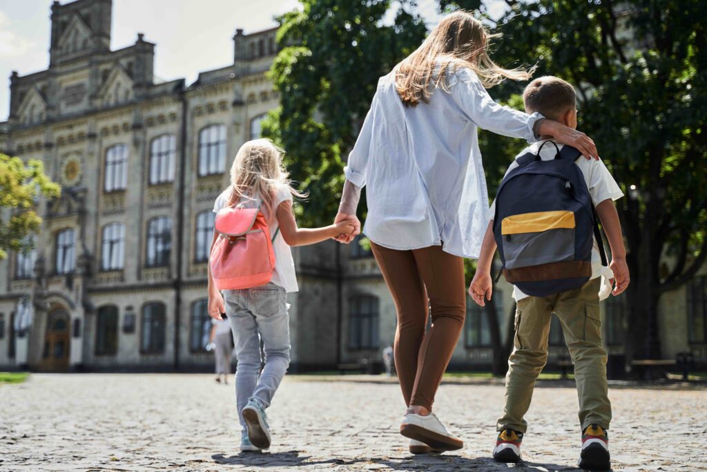  A young mum walking her children to school